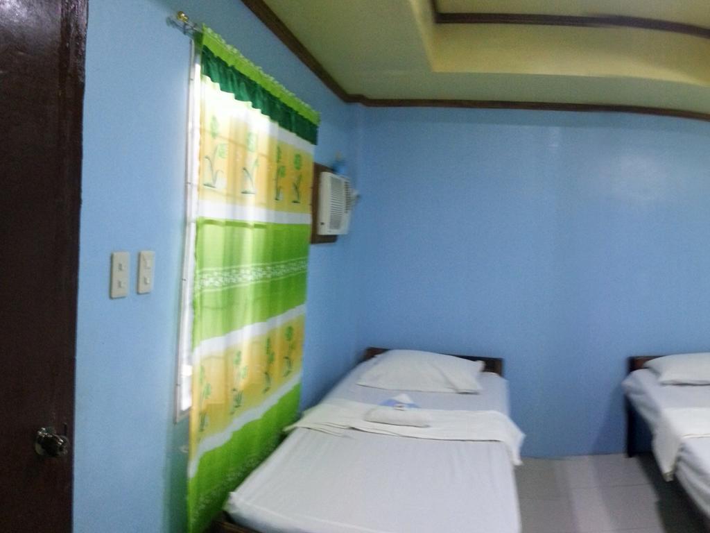 Dhayne Pension Puerto Princesa Rum bild